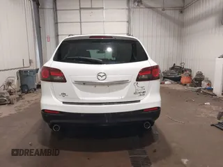 2014 Mazda CX-9 Grand Touring with VIN JM3TB3DA7E0428187, listed as a IAAI auction lot 41247569 with 117,590 mi miles and . Bid and sale history available at DreamBid. Image 17.