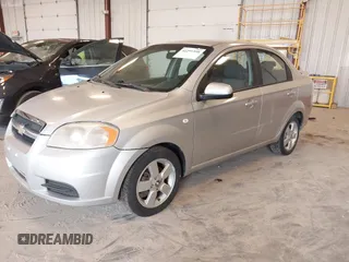 2008 Chevrolet Aveo LS with VIN KL1TD56618B064257, listed as a IAAI auction lot 42299398 with 158,877 mi miles and . Bid and sale history available at DreamBid. Image 2.