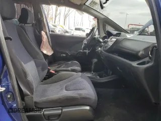 2013 Honda Fit Sport with VIN JHMGE8H56DC068174, listed as a Copart auction lot 50687815 with 106,629 mi miles and Salvage Title. Bid and sale history available at carsss.com. Image 7.