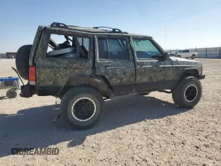 1999 Jeep Cherokee Sport with VIN 1J4FF68S6XL645028, listed as a Copart auction lot 48897255 with 218,552 mi miles and Salvage Title. Bid and sale history available at carsss.com. Image 3.