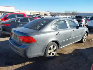 2009 Kia Optima LX with VIN KNAGE228395361458, listed as a IAAI auction lot 41418800 with 182,220 mi miles. Bid and sale history available at carsss.com. Image 4.