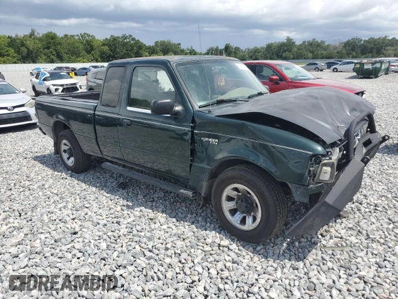 2002 Ford Ranger XLT Appearance with VIN 1FTYR44E42TA32828, listed as a Copart auction lot 60205715 with 290,846 mi miles and Salvage title. Bid and sale history available at DreamBid. Image 4.