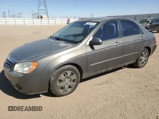 2006 Kia Spectra EX with VIN KNAFE122X65277053, listed as a Copart auction lot 75697314 with 147,156 mi miles and Salvage Title. Bid and sale history available at carsss.com. Image 1.