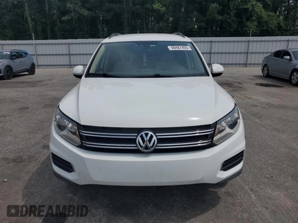 2017 Volkswagen Tiguan S with VIN WVGAV7AX7HK017576, listed as a Copart auction lot 58487455 with 100,034 mi miles and Salvage title. Bid and sale history available at DreamBid. Image 5.