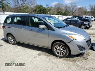 2014 Mazda 5 Sport with VIN JM1CW2BL3E0168267, listed as a Copart auction lot 50696245 with 196,541 mi miles and Salvage Title. Bid and sale history available at DreamBid. Image 4.