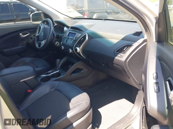 2013 Hyundai Tucson GLS with VIN KM8JU3AC3DU551018, listed as a IAAI auction lot 41988305 with 214,728 mi miles. Bid and sale history available at carsss.com. Image 5.
