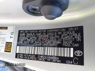 2021 Toyota Prius L Eco with VIN JTDKAMFUXM3144991, listed as a IAAI auction lot 42147025 with 106,466 mi miles and . Bid and sale history available at DreamBid. Image 9.
