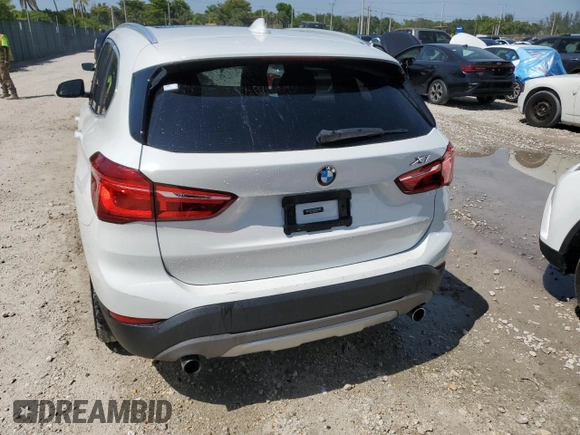 2018 BMW X1 sDrive28i with VIN WBXHU7C38J5H44459, listed as a Copart auction lot 49107553 with 96,494 mi miles and . Bid and sale history available at DreamBid. Image 6.