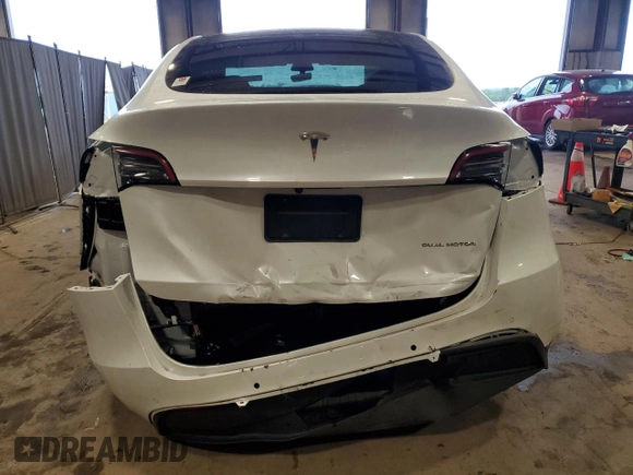 2022 Tesla Model Y Long Range z VIN 7SAYGDEEXNA012904, wystawiony jako Copart lot #57492865 z przebiegiem 31 294 mil mil oraz Szkody całkowita. Historia ofert i sprzedaży dostępna na DreamBid. Obrazek 6.