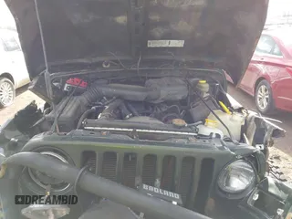 1997 Jeep Wrangler SE with VIN 1J4FY29PXVP406939, listed as a IAAI auction lot 41612380 with 248,314 mi miles. Bid and sale history available at carsss.com. Image 10.