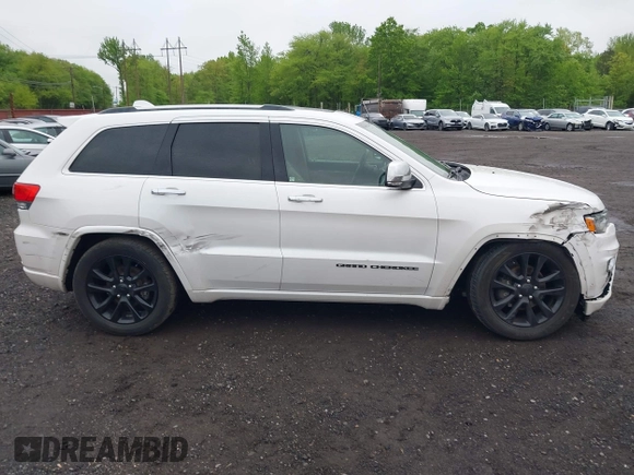 2018 Jeep Grand Cherokee High Altitude z VIN 1C4RJFCG7JC216122, wystawiony jako IAAI lot #42221311 z przebiegiem 121 852 mil mil oraz . Historia ofert i sprzedaży dostępna na DreamBid. Obrazek 13.