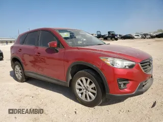 2016 Mazda CX-5 Touring with VIN JM3KE2CYXG0638247, listed as a Copart auction lot 53087305 with 0 mi miles and Salvage Title. Bid and sale history available at carsss.com. Image 4.