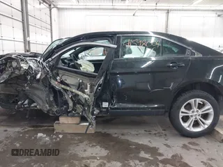 2015 Ford Taurus SEL with VIN 1FAHP2E81FG181897, listed as a IAAI auction lot 41598004 with Not Provided miles and . Bid and sale history available at carsss.com. Image 15.
