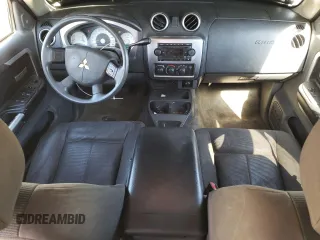 2007 Mitsubishi Raider LS z VIN 1Z7HT28K57S234309, wystawiony jako Copart lot #75505104 z przebiegiem 210 964 mil mil oraz Szkoda całkowita • Salvage title. Historia ofert i sprzedaży dostępna na DreamBid. Obrazek 8.