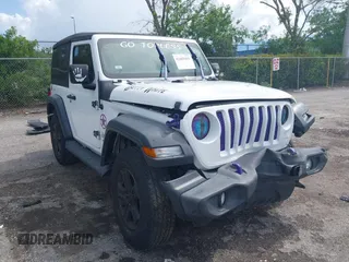 2018 Jeep Wrangler Sport with VIN 1C4GJXAGXJW151460, listed as a IAAI auction lot 42465411 with Not provided miles and . Bid and sale history available at DreamBid. Image 1.