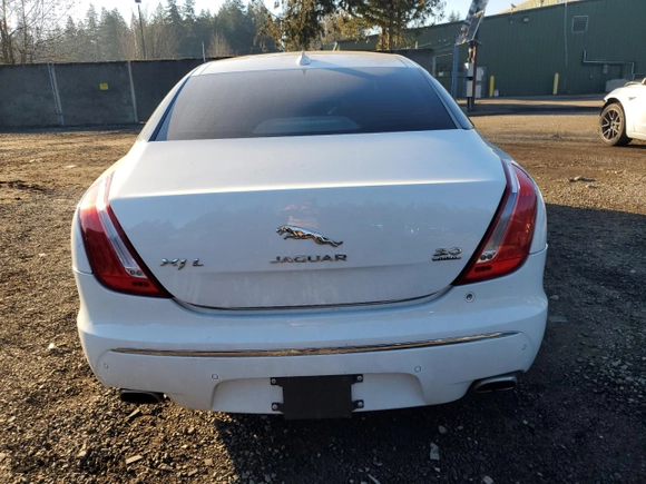 2014 Jaguar XJ with VIN SAJWJ2GD2E8V61998, listed as a Copart auction lot 42962645 with 101,609 mi miles and Salvage Title. Bid and sale history available at carsss.com. Image 6.