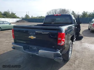 2017 Chevrolet Silverado 1500 LT with VIN 1GCVKREC3HZ126576, listed as a IAAI auction lot 41477637 with 124,670 mi miles. Bid and sale history available at carsss.com. Image 4.