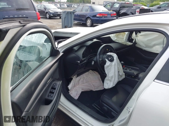 2023 Mazda 3 S Select with VIN JM1BPAKM9P1604211, listed as a IAAI auction lot 42093424 with Not provided miles and . Bid and sale history available at DreamBid. Image 5.