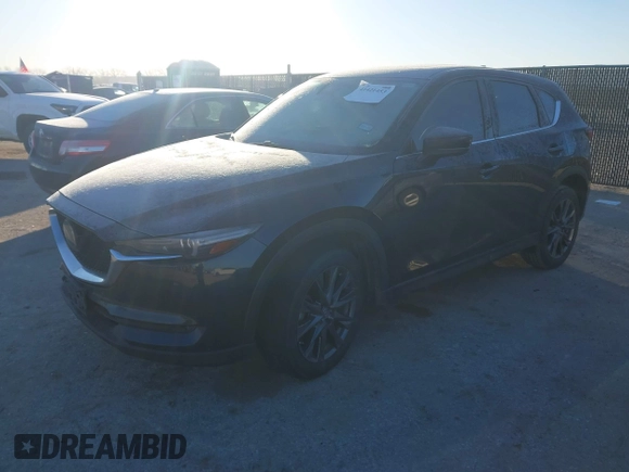 2019 Mazda CX-5 Signature with VIN JM3KFBEY5K0656965, listed as a IAAI auction lot 41421453 with 99,073 mi miles. Bid and sale history available at carsss.com. Image 17.