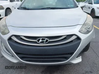 2013 Hyundai Elantra GT with VIN KMHD35LE7DU131627, listed as a IAAI auction lot 42093450 with 147,183 mi miles. Bid and sale history available at carsss.com. Image 6.
