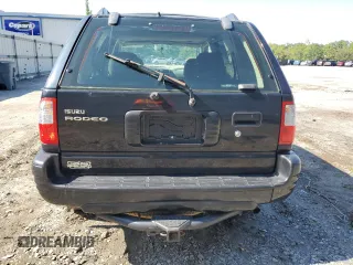 2002 Isuzu Rodeo S z VIN 4S2CK58W924321032, wystawiony jako Copart lot #66145264 z przebiegiem 184 325 mil mil oraz Szkody całkowita. Historia ofert i sprzedaży dostępna na DreamBid. Obrazek 6.
