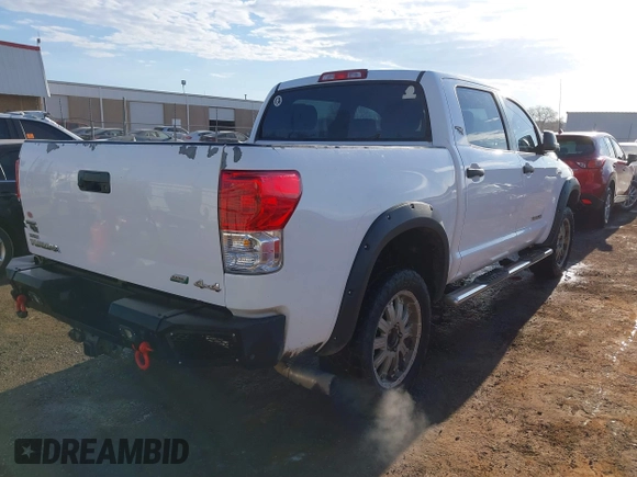 2012 Toyota Tundra 4WD Truck with VIN 5TFDW5F10CX241968, listed as a IAAI auction lot 41858300 with 272,634 mi miles. Bid and sale history available at carsss.com. Image 4.
