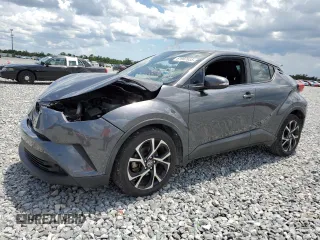 2018 Toyota C-HR XLE z VIN NMTKHMBX7JR000609, wystawiony jako Copart lot #61997655 z przebiegiem 100 062 mil mil oraz Szkoda całkowita • Salvage title. Historia ofert i sprzedaży dostępna na DreamBid. Obrazek 1.