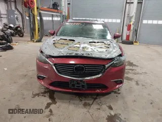 2016 Mazda Mazda6 i Grand Touring with VIN JM1GJ1W54G1432681, listed as a IAAI auction lot 41624888 with 100,410 mi miles. Bid and sale history available at carsss.com. Image 12.