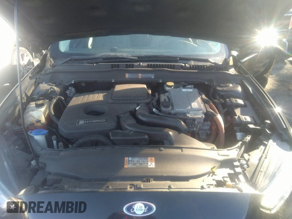 2015 Ford Fusion S Hybrid with VIN 3FA6P0UU9FR246868, listed as a IAAI auction lot 41307984 with 153,466 mi miles. Bid and sale history available at carsss.com. Image 10.