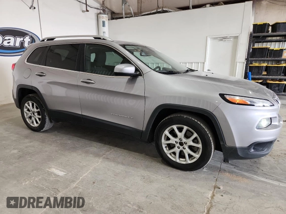 2017 Jeep Cherokee Latitude with VIN 1C4PJLCB3HD232882, listed as a Copart auction lot 63185575 with 126,000 mi miles and Salvage title. Bid and sale history available at DreamBid. Image 4.