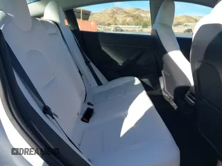 2023 Tesla Model 3 with VIN 5YJ3E1EAXPF486639, listed as a IAAI auction lot 41387797 with 18,603 mi miles and . Bid and sale history available at carsss.com. Image 8.