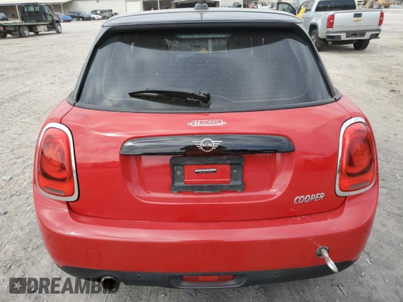 2021 MINI Hardtop 4 Door Oxford Edition z VIN WMWXU7C08M2N49721, wystawiony jako Copart lot #77983324 z przebiegiem 64 096 mil mil oraz Szkoda całkowita • Salvage title. Historia ofert i sprzedaży dostępna na DreamBid. Obrazek 6.