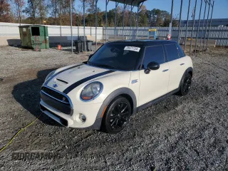 2017 MINI Hardtop 4 Door Cooper S z VIN WMWXU3C37H2F49415, wystawiony jako Copart lot #78471134 z przebiegiem 51 997 mil mil oraz Szkody całkowita. Historia ofert i sprzedaży dostępna na DreamBid. Obrazek 1.