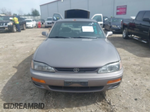 1996 Toyota Camry DX with VIN 4T1BG12K8TU762073, listed as a IAAI auction lot 41606136 with 254,939 mi miles. Bid and sale history available at carsss.com. Image 6.