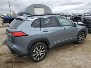 2023 Toyota Corolla Cross XLE with VIN 7MUDAABG1PV052040, listed as a Copart auction lot 51840315 with 43,228 mi miles and Salvage title. Bid and sale history available at DreamBid. Image 3.