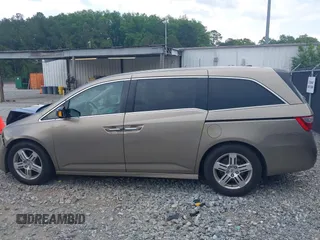 2011 Honda Odyssey Touring с VIN 5FNRL5H98BB095796, выставлен на аукционе IAAI как лот 42094695 с пробегом 158 410 миль миль и . История ставок и продаж доступна на DreamBid. Изображение 15.