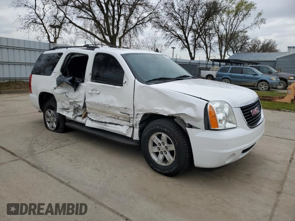 2014 GMC Yukon SLT with VIN 1GKS1CE05ER249398, listed as a Copart auction lot 47493915 with 139,824 mi miles and Salvage Title. Bid and sale history available at carsss.com. Image 4.