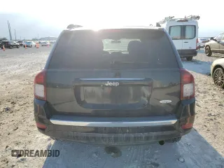 2014 Jeep Compass High Altitude with VIN 1C4NJCEA9ED889158, listed as a Copart auction lot 45805095 with 104,981 mi miles and Salvage Title. Bid and sale history available at carsss.com. Image 6.
