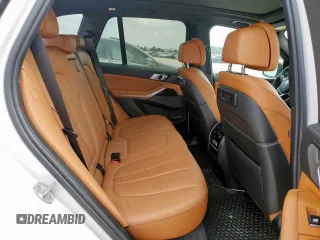 2021 BMW X5 sDrive40i with VIN 5UXCR4C06M9F56578, listed as a Copart auction lot 58218315 with 69,927 mi miles and Salvage title. Bid and sale history available at DreamBid. Image 10.