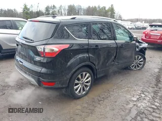 2018 Ford Escape Titanium с VIN 1FMCU9J99JUA14598, выставлен на аукционе IAAI как лот 41859368 с пробегом 59 438 миль миль и . История ставок и продаж доступна на DreamBid. Изображение 4.