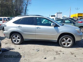 2008 Lexus RX with VIN 2T2HK31U98C061120, listed as a IAAI auction lot 42115282 with 176,867 mi miles. Bid and sale history available at carsss.com. Image 13.