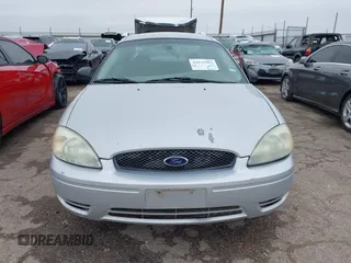 2006 Ford Taurus SE z VIN 1FAFP53U26A234490, wystawiony jako IAAI lot #42125983 z przebiegiem 173 686 mil mil oraz . Historia ofert i sprzedaży dostępna na DreamBid. Obrazek 13.