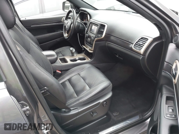 2014 Jeep Grand Cherokee Limited with VIN 1C4RJEBG0EC555774, listed as a IAAI auction lot 42160952 with 102,076 mi miles and . Bid and sale history available at DreamBid. Image 5.