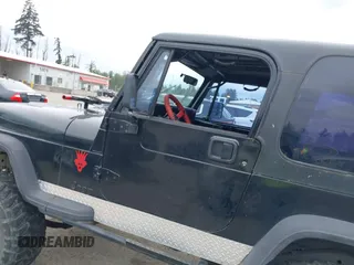 1994 Jeep Wrangler z VIN 1J4FY29S7RP474769, wystawiony jako IAAI lot #42283575 z przebiegiem 154 422 mil mil oraz . Historia ofert i sprzedaży dostępna na DreamBid. Obrazek 6.