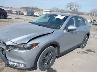 2019 Mazda CX-5 Sport with VIN JM3KFBBM6K1582760, listed as a IAAI auction lot 41822152 with 60,620 mi miles and . Bid and sale history available at DreamBid. Image 17.