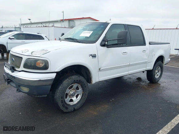 2001 Ford F-150 SuperCrew XLT with VIN 1FTRW08W11KD99683, listed as a IAAI auction lot 41329500 with 218,080 mi miles. Bid and sale history available at carsss.com. Image 20.