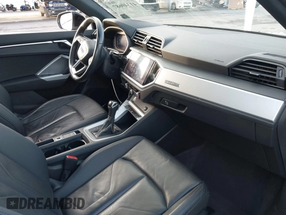 2019 Audi Q3 Premium with VIN WA1AECF33K1079468, listed as a IAAI auction lot 41340687 with 53,134 mi miles and . Bid and sale history available at DreamBid. Image 5.