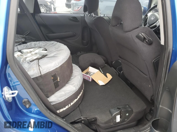 2007 Honda Fit Sport with VIN JHMGD38617S032997, listed as a Copart auction lot 54865225 with 182,428 mi miles and Salvage Title. Bid and sale history available at carsss.com. Image 11.
