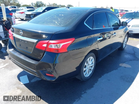 2018 Nissan Sentra SV with VIN 3N1AB7AP4JL641839, listed as a IAAI auction lot 41765372 with 164,407 mi miles and . Bid and sale history available at DreamBid. Image 4.