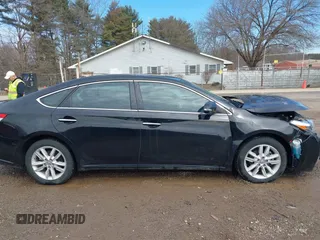2014 Toyota Avalon Limited with VIN 4T1BK1EB2EU103936, listed as a IAAI auction lot 41703894 with 104,657 mi miles. Bid and sale history available at carsss.com. Image 14.